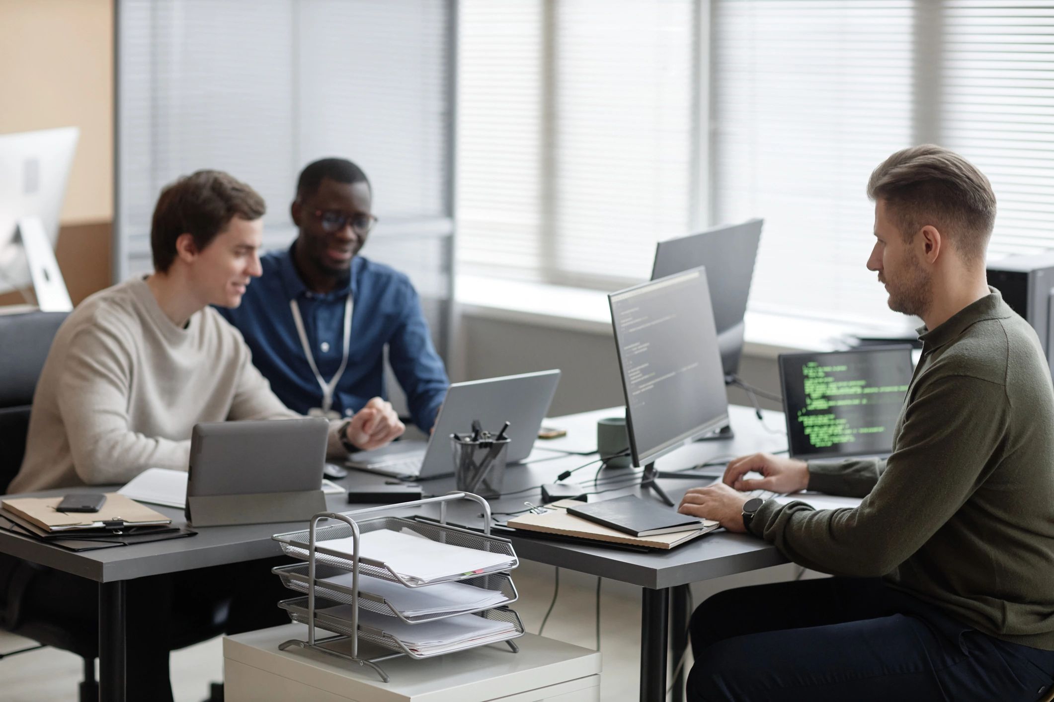 Software development team working together in a modern office