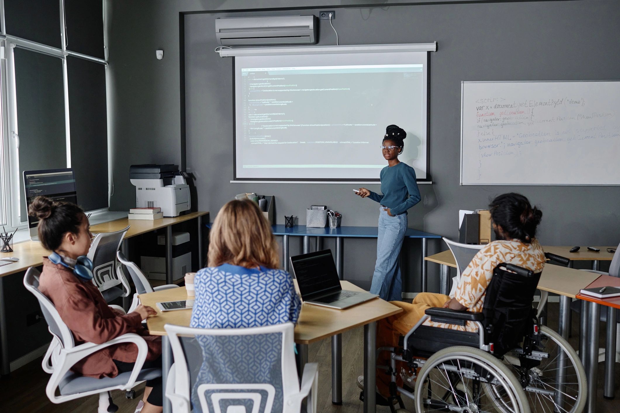 IT team collaborating during a technical presentation