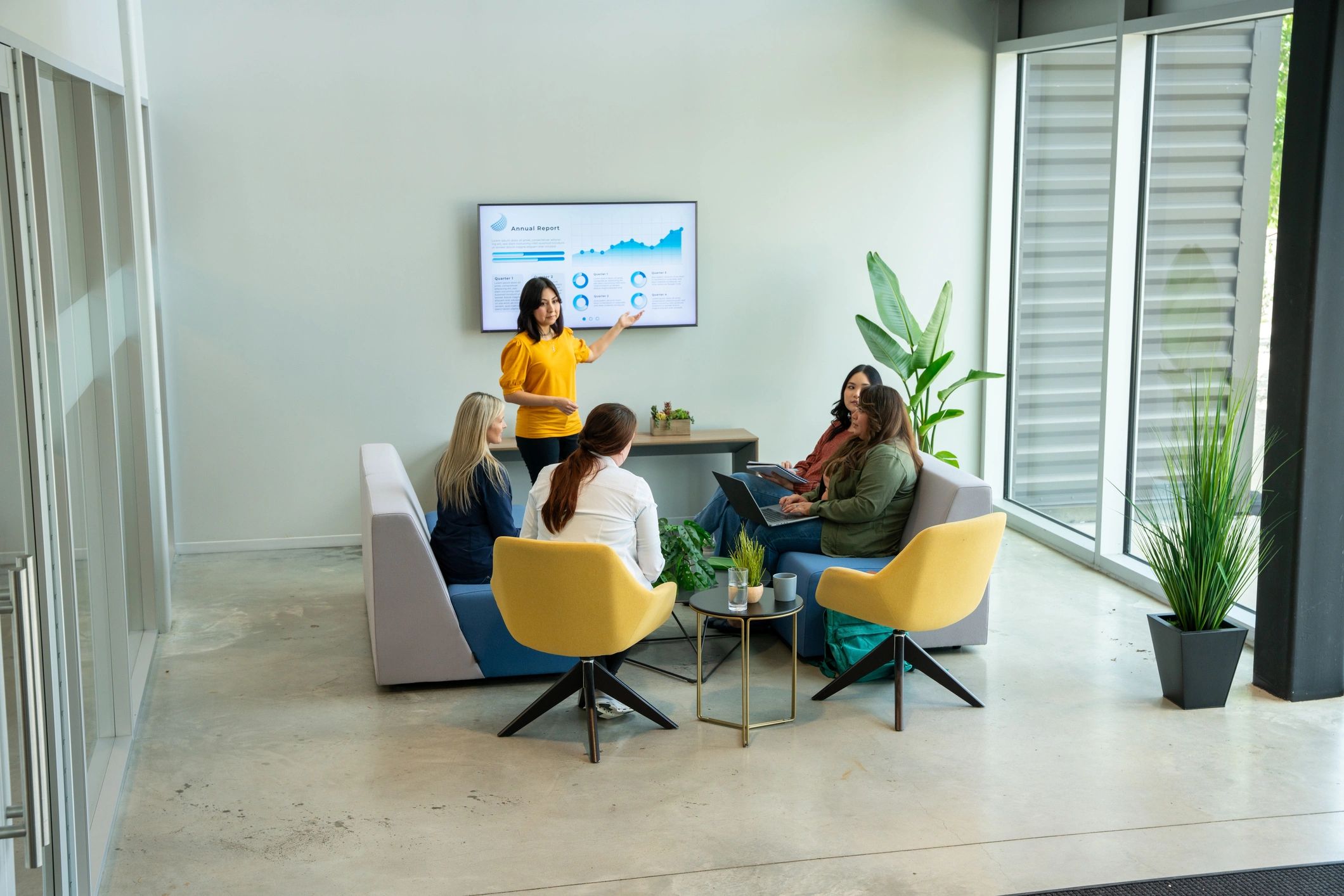 Professional technology team meeting in a modern office