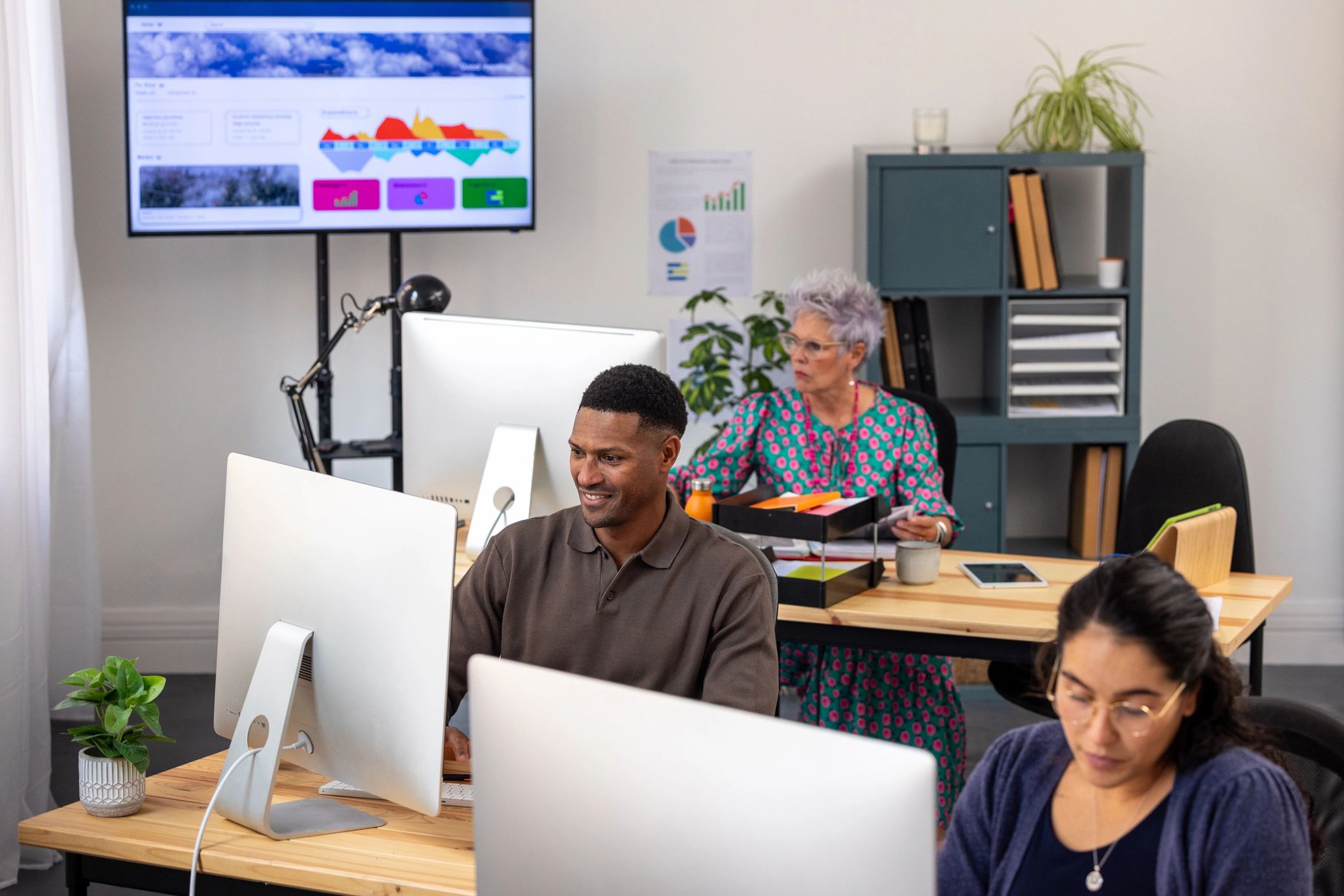 Software development team working in a modern office