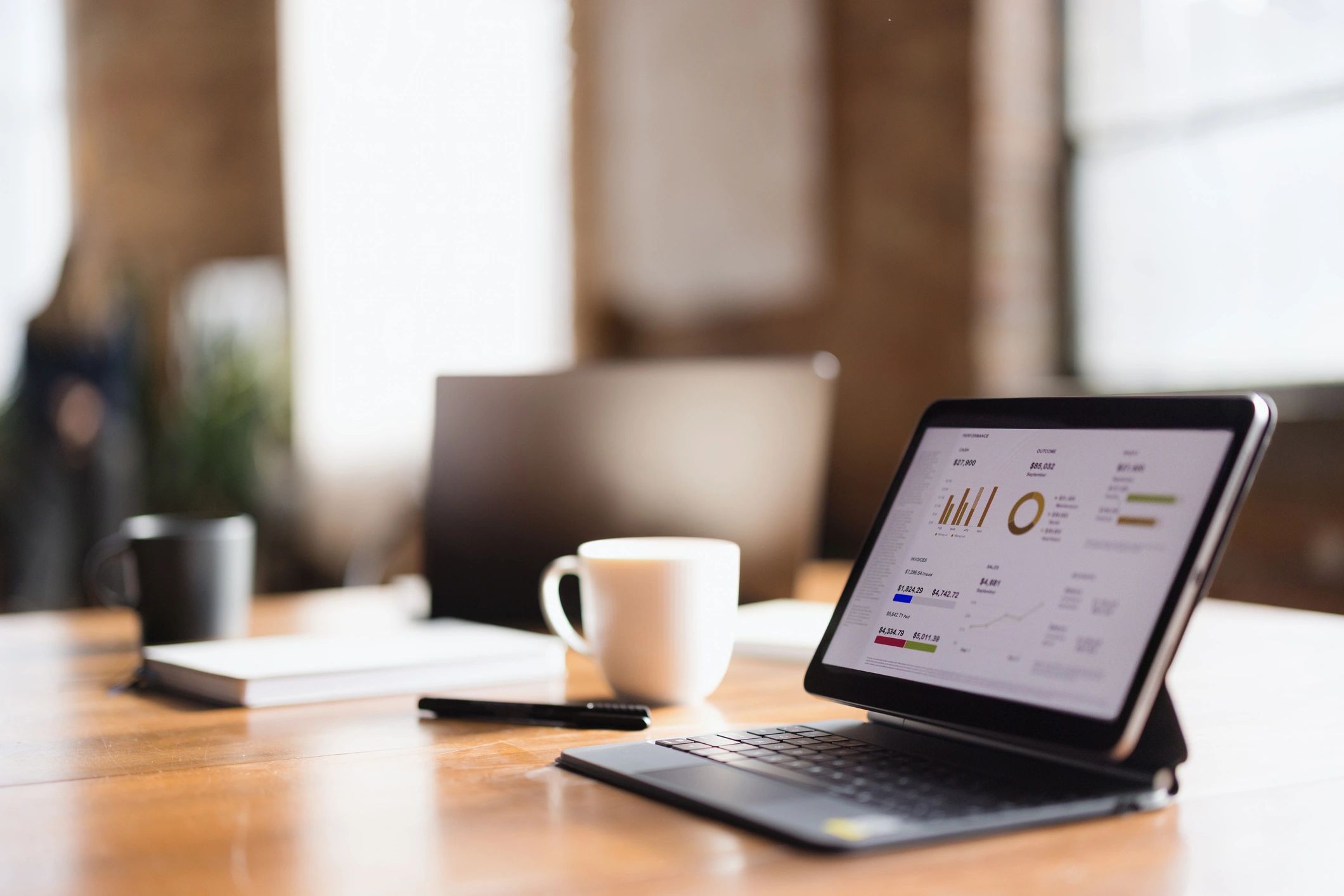 Digital business analytics dashboard on a tablet